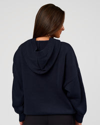 Woman wearing All Day Active Knitted Hoodie - Future Navy | Model:Bianca | Size:S