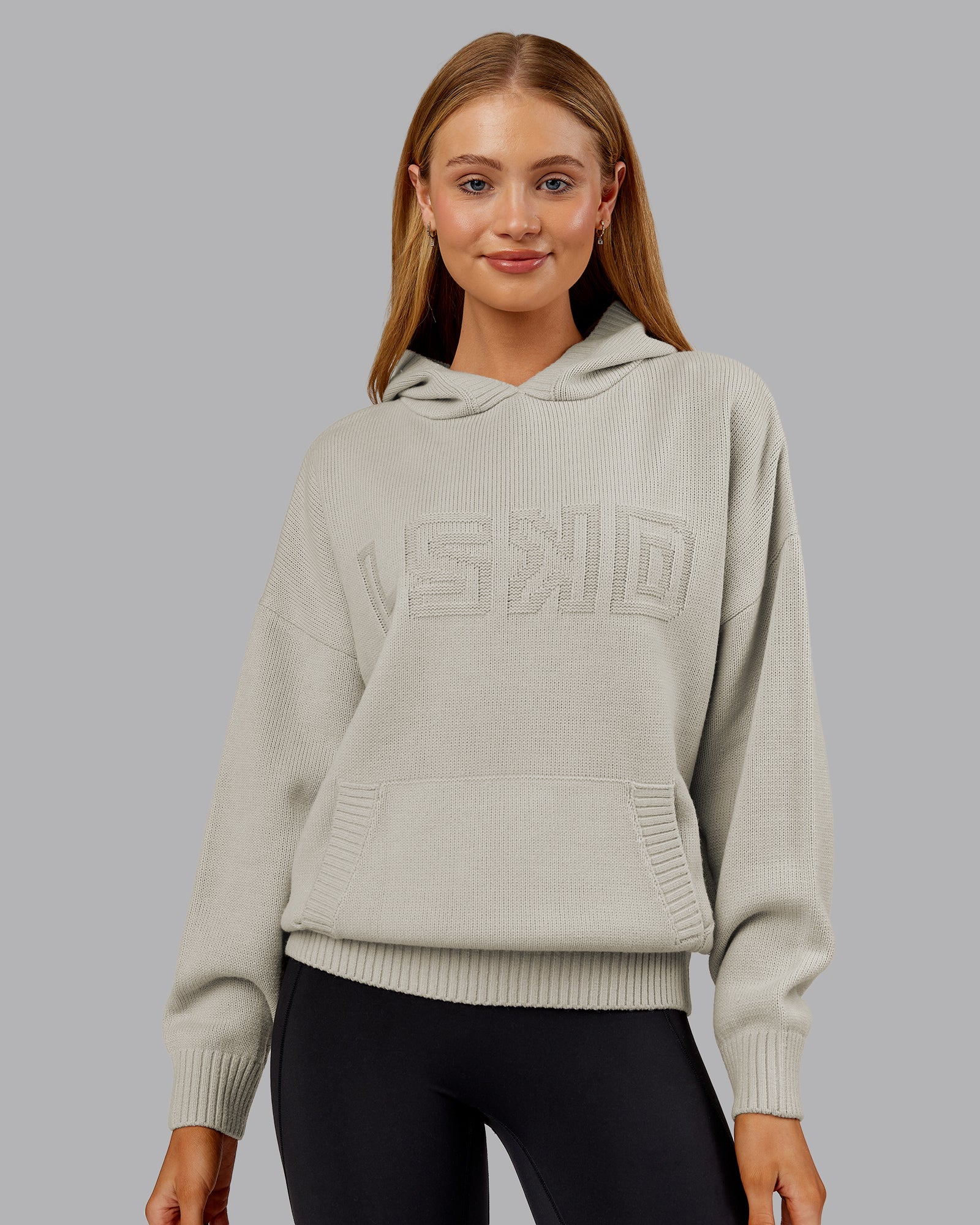 Woman wearing All Day Active Knitted Hoodie - Shale Beige | Model:Ella | Size:S
