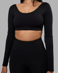 Woman wearing Aria Long Sleeve Sports Bra - Black | Model:Rhiley | Size:S