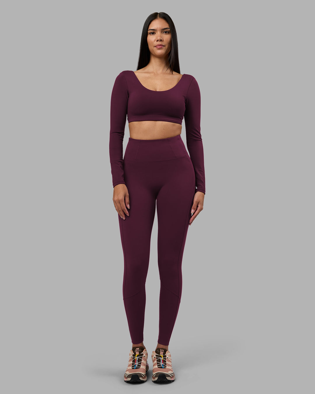 Woman wearing Aria Long Sleeve Sports Bra - Cherry Lacquer | Model:Rhiley | Size:S