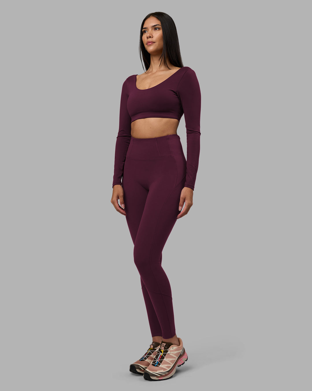 Woman wearing Aria Long Sleeve Sports Bra - Cherry Lacquer | Model:Rhiley | Size:S
