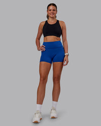 Woman wearing Ascent Sports Bra - Black | Model:Phoebe | Size:S