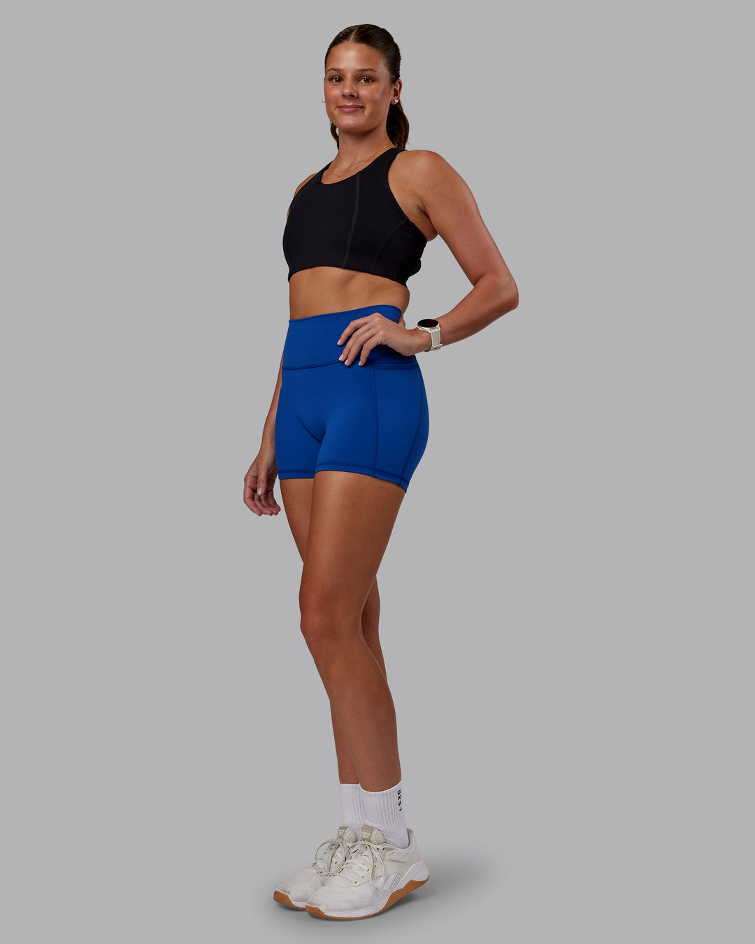 Woman wearing Ascent Sports Bra - Black | Model:Phoebe | Size:S