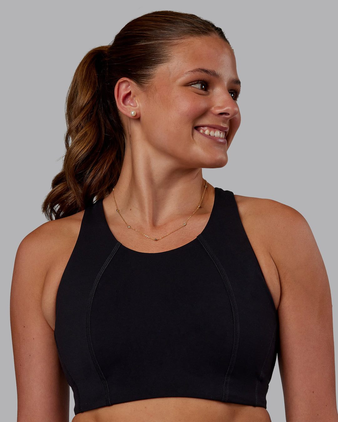 Woman wearing Ascent Sports Bra - Black | Model:Phoebe | Size:S