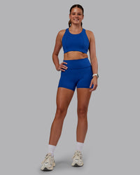 Woman wearing Ascent Sports Bra - Blue Quartz | Model:Phoebe | Size:S