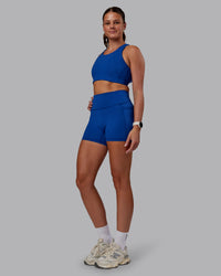 Woman wearing Ascent Sports Bra - Blue Quartz | Model:Phoebe | Size:S