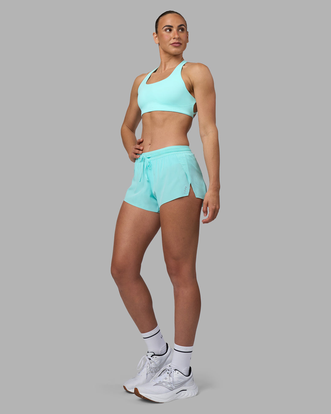 Woman wearing Aspire Sports Bra - Island Paradise | Model:Sophie | Size:S
