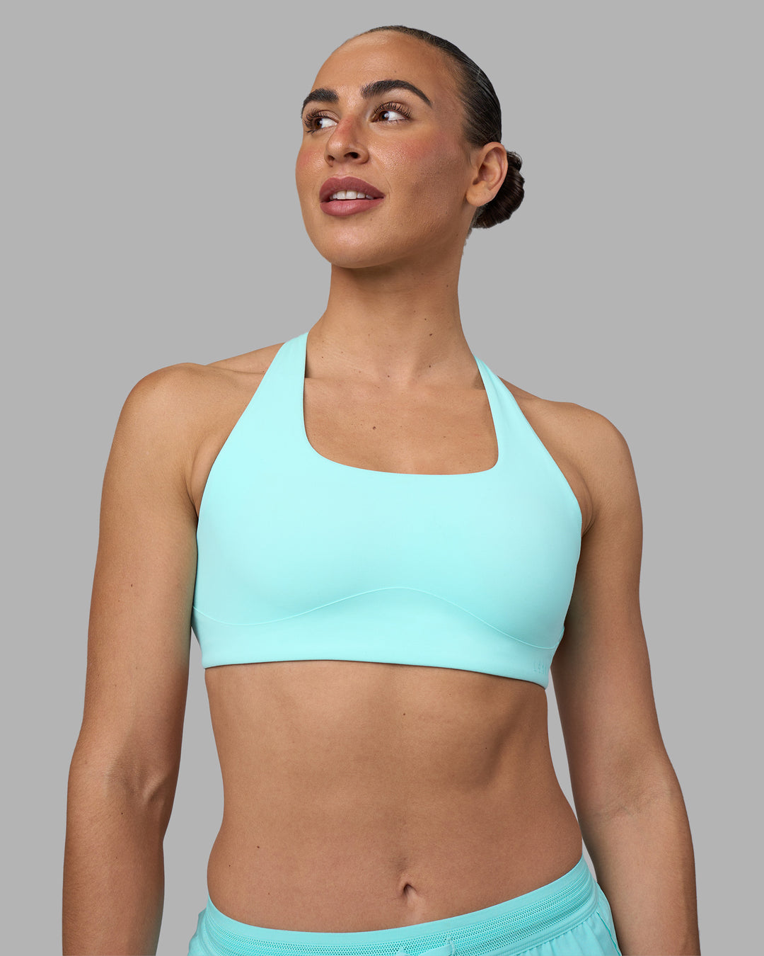 Woman wearing Aspire Sports Bra - Island Paradise | Model:Sophie | Size:S