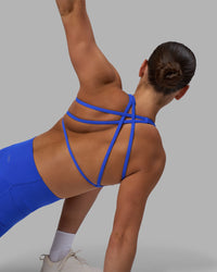 Woman wearing Aspire Sports Bra - Power Cobalt | Model:Keisha | Size:S