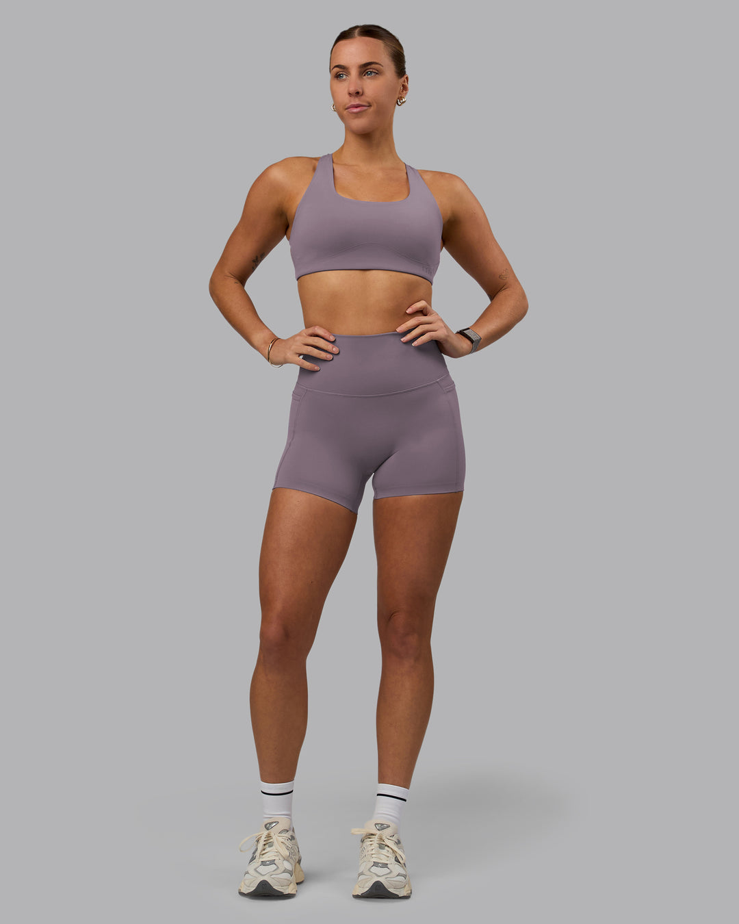 Woman wearing Aspire Sports Bra - Purple Sage