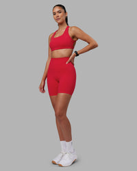 Woman wearing Aspire Sports Bra - Scarlet | Model:Rhiley | Size:S | Thumbnail Index: 2