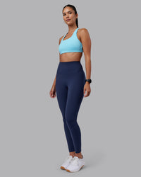 Woman wearing Aspire Sports Bra - Sky Blue | Model:Rhiley | Size:S