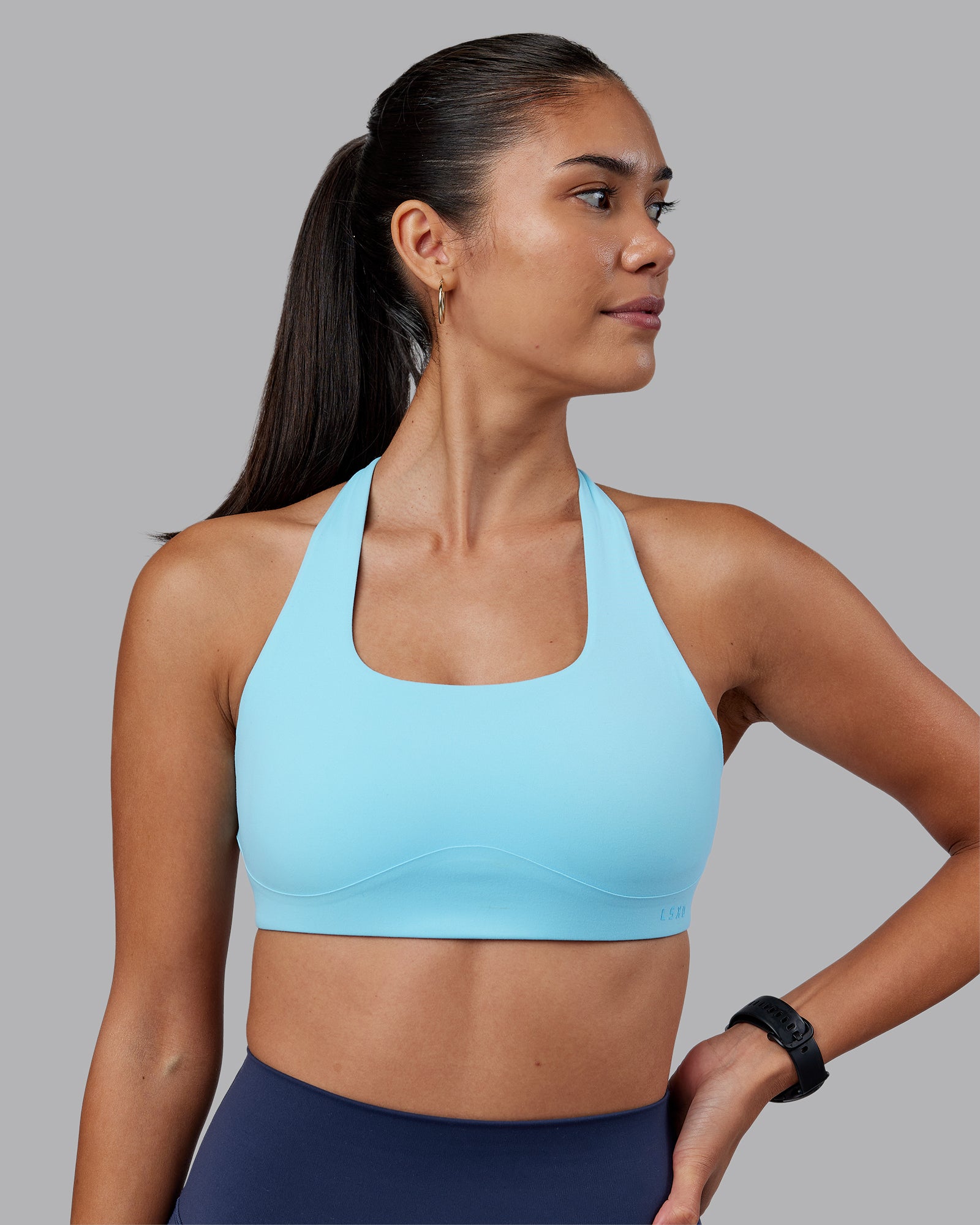 Woman wearing Aspire Sports Bra - Sky Blue | Model:Rhiley | Size:S