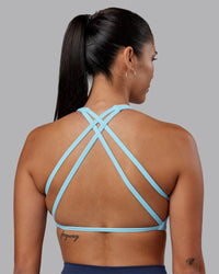 Woman wearing Aspire Sports Bra - Sky Blue | Model:Rhiley | Size:S