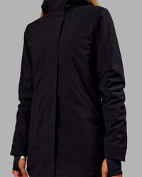 Woman wearing Auxiliary 2.0 Jacket - Black | Model:Ella | Size:S