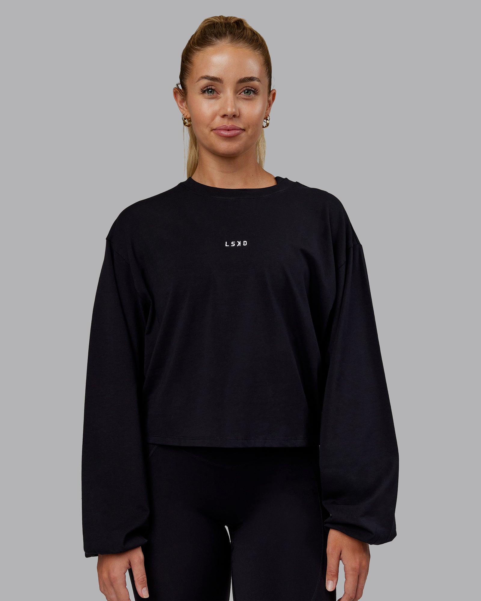 Woman wearing Go-To Balloon Sleeve FLXCotton Tee - Black | Model:Hannah | Size:S
