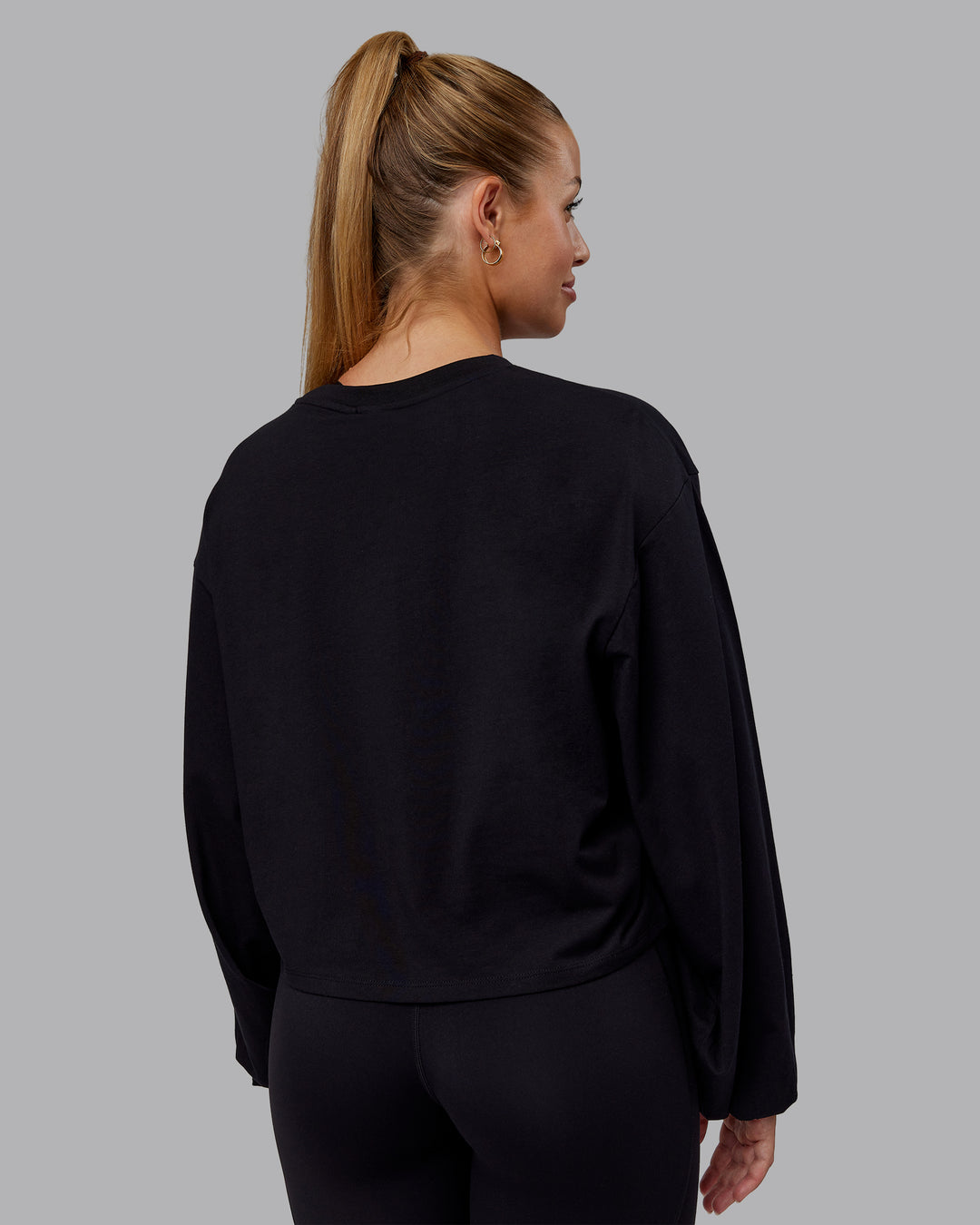 Woman wearing Go-To Balloon Sleeve FLXCotton Tee - Black | Model:Hannah | Size:S