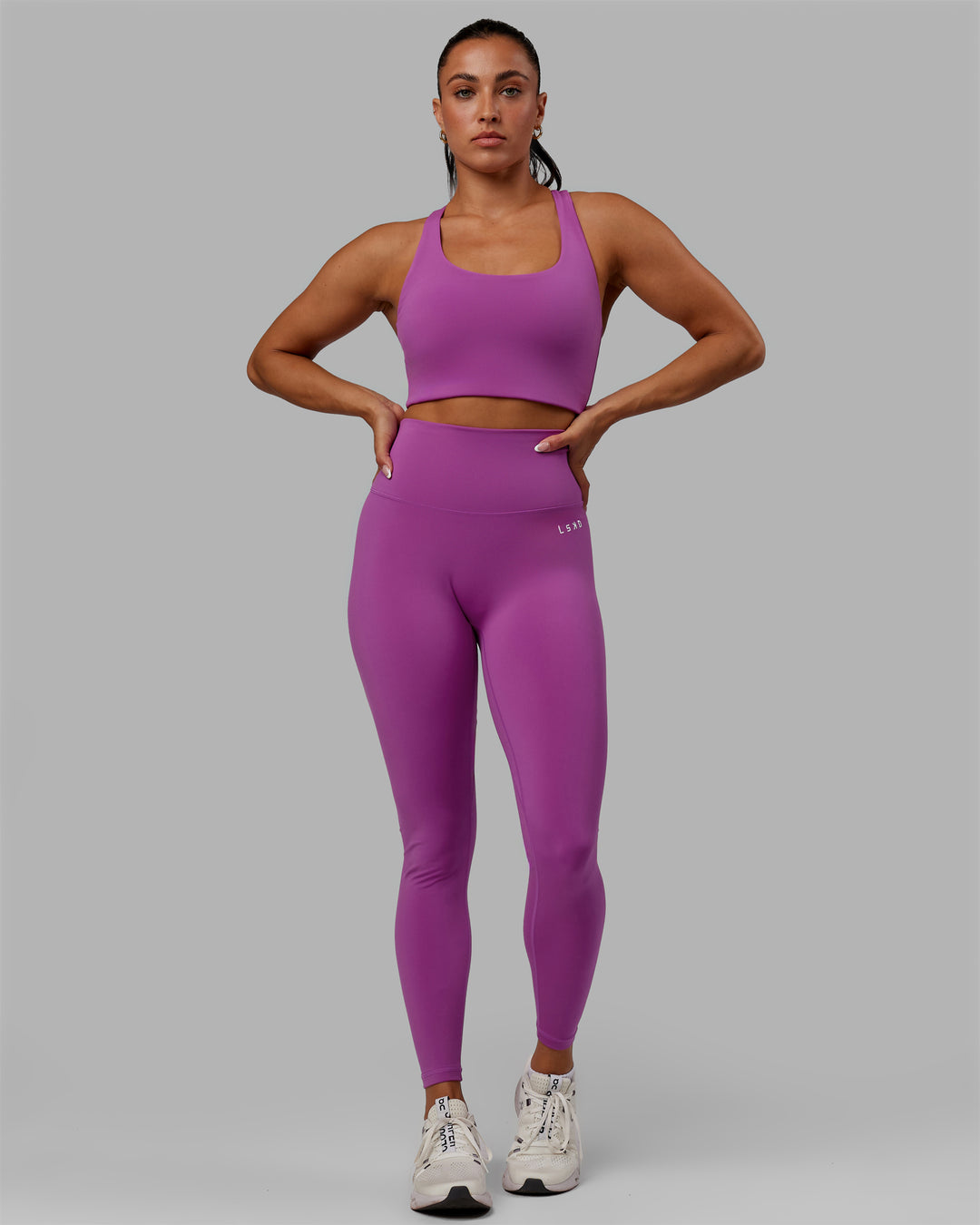 Woman wearing Base 2.0 Full Length Tights - Hyper Violet