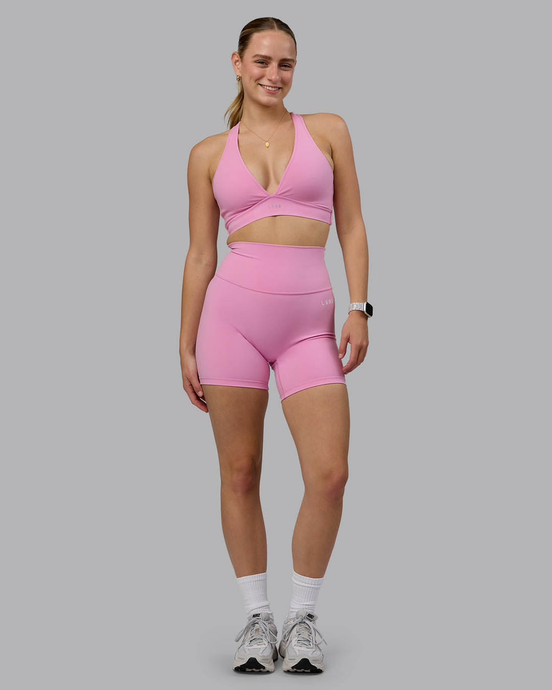 Woman wearing Base 2.0 Ultra High-Rise 6&quot; Short - Bubblegum