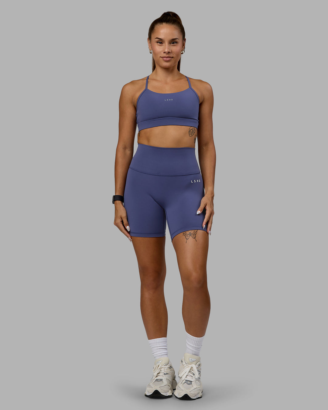 Woman wearing Base 2.0 Ultra High-Rise 6&quot; Short - Future Dusk