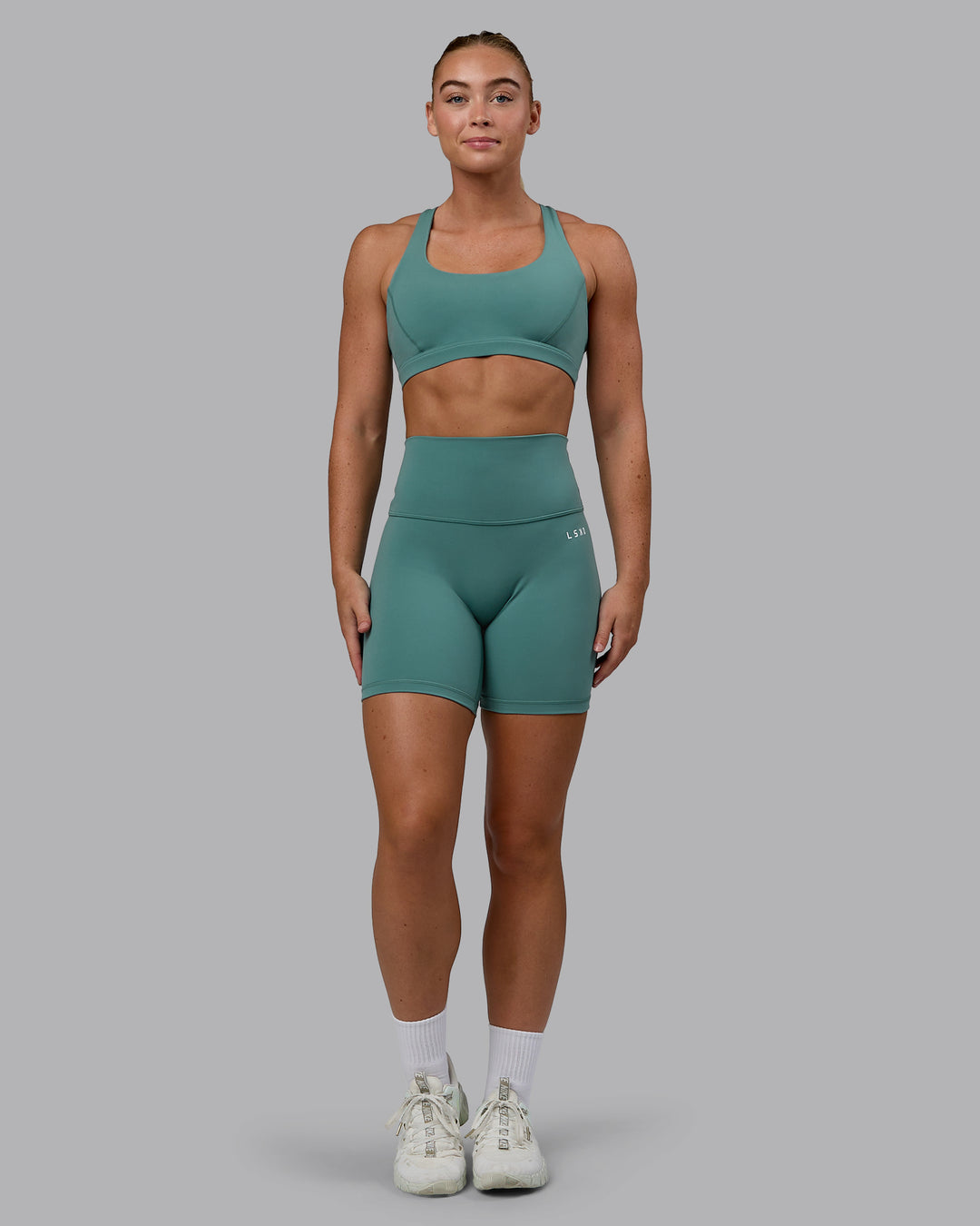 Woman wearing Base 2.0 Ultra High-Rise 6&quot; Short - Sagebrush