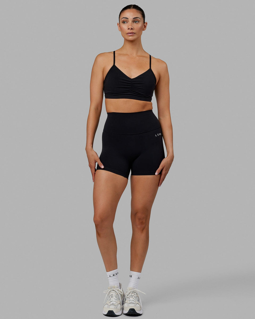 Woman wearing Base 2.0 Ultra High-Rise 4&quot; Short - Black
