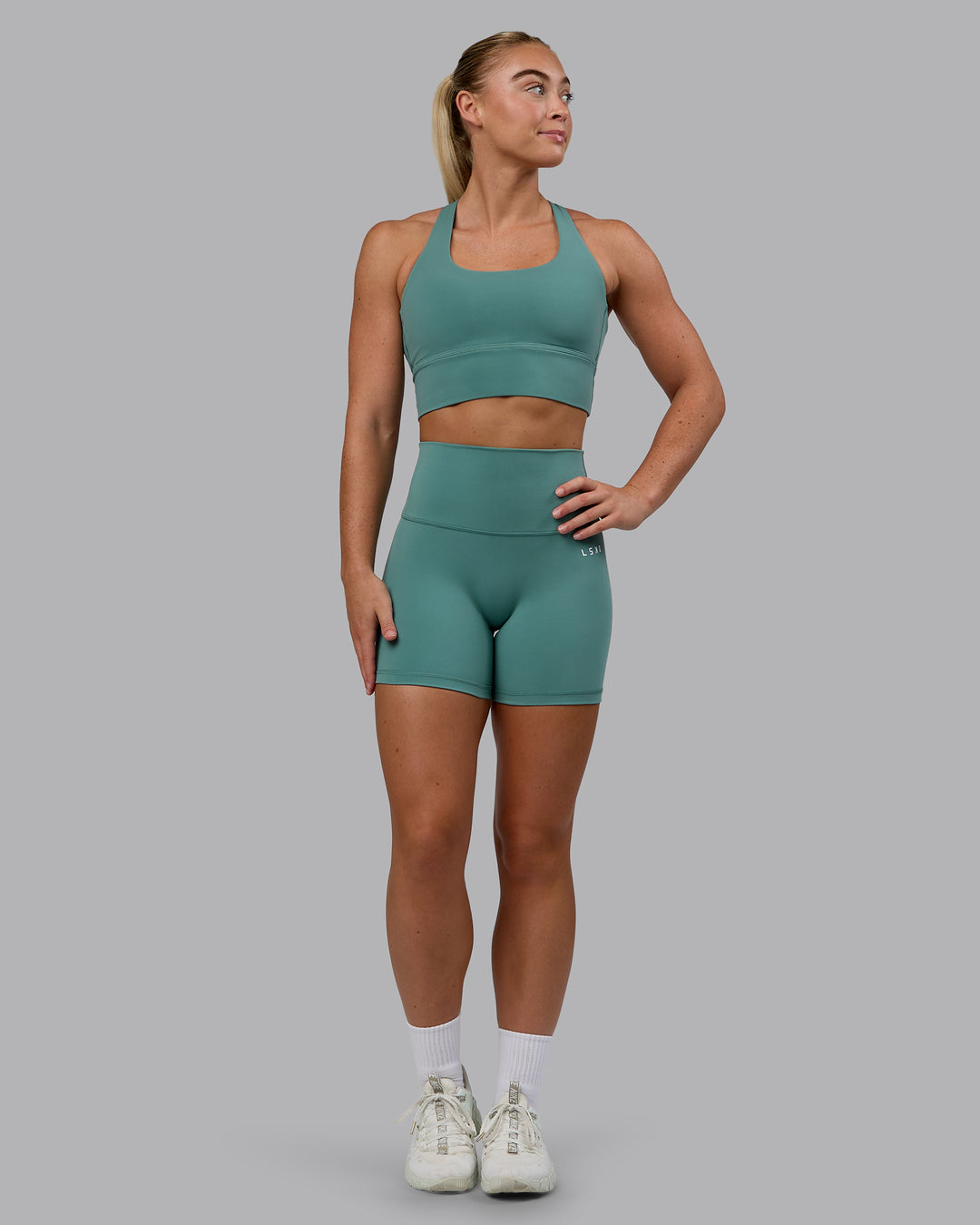 Woman wearing Base 2.0 Ultra High-Rise 4&quot; Short - Sagebrush