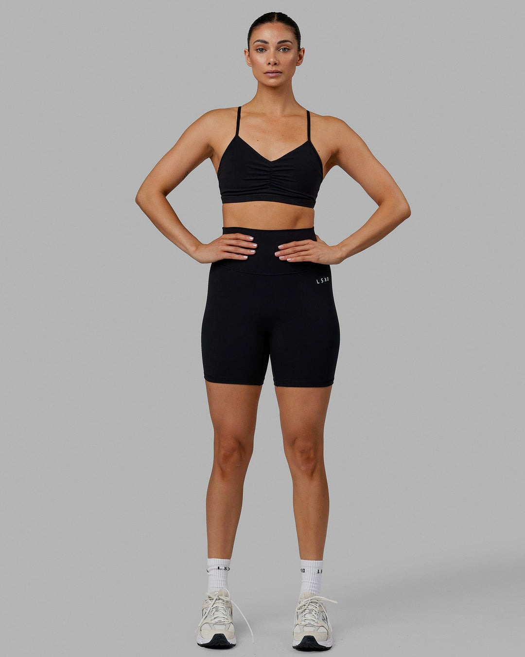 Woman wearing Base 2.0 Ultra High-Rise 6&quot; Short - Black