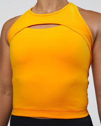 Woman wearing Be Bold Performance Tank - Zinnia | Model:Tenaya | Size:S