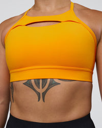 Woman wearing Be Bold Sports Bra - Zinnia | Model:Tenaya | Size:S