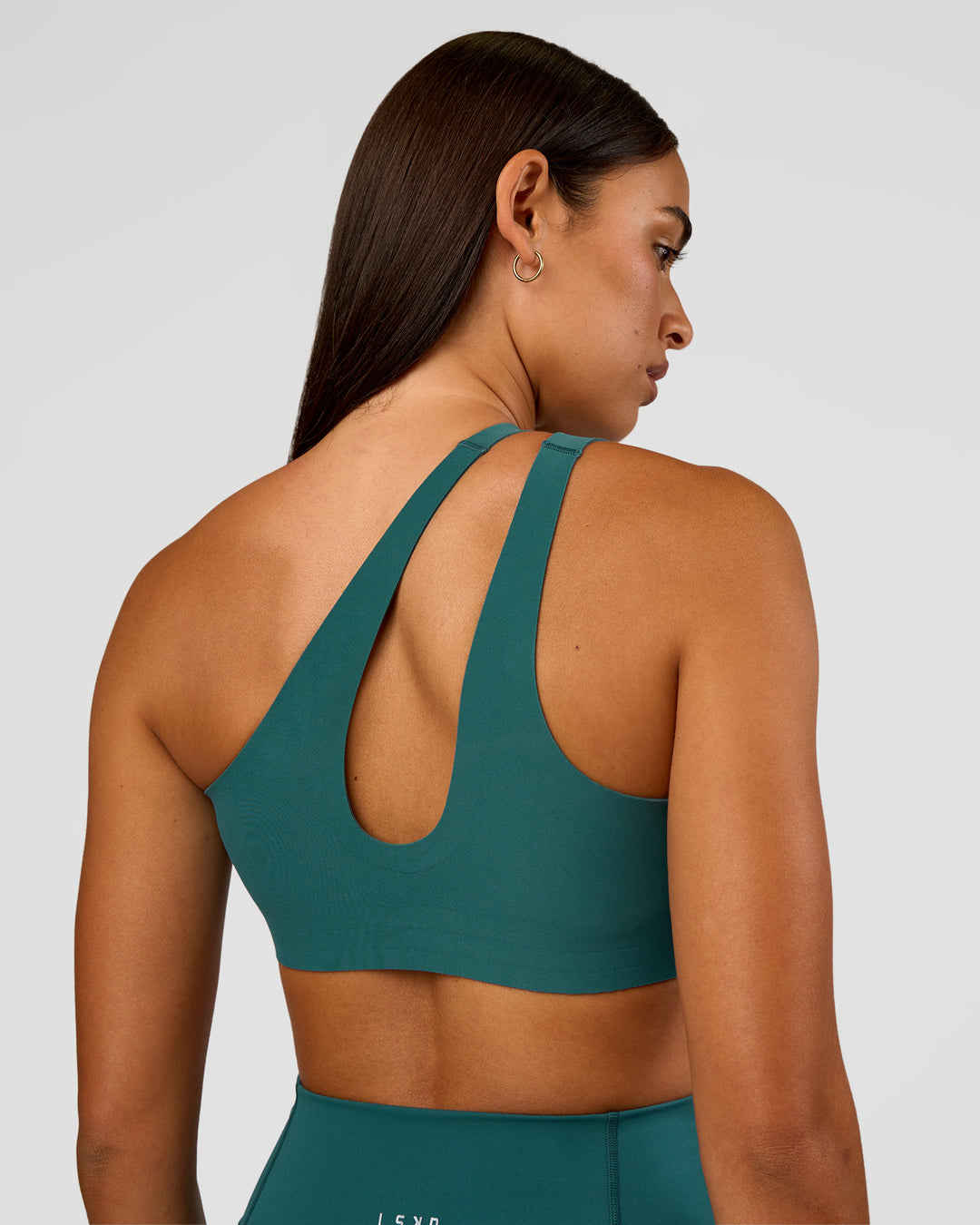 Woman wearing Bend &amp; FLX Plunge Sports Bra - Transformative Teal | Model:Ruby | Size:S