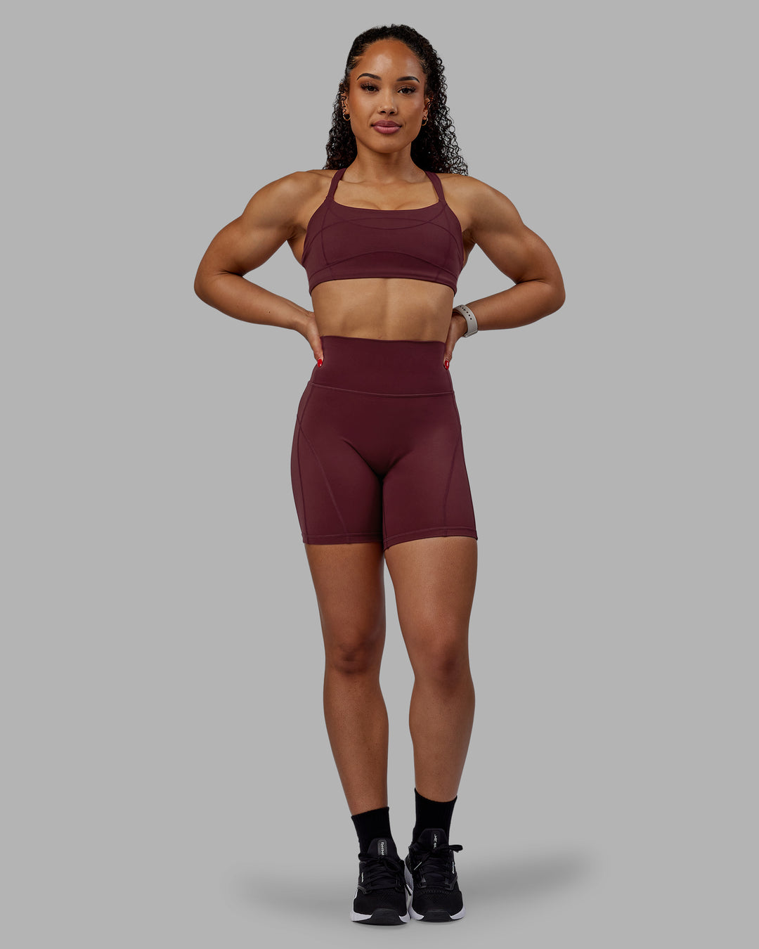 Woman wearing Bend Ultra High-Rise 6" Short - Dark Cherry