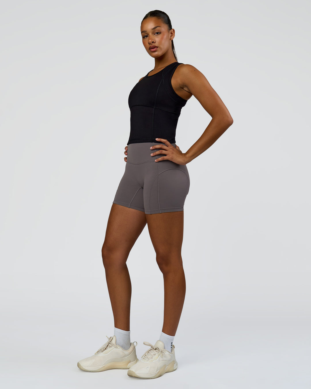 Woman wearing Bend Performance Tank - Black | Model:Rosie | Size:S
