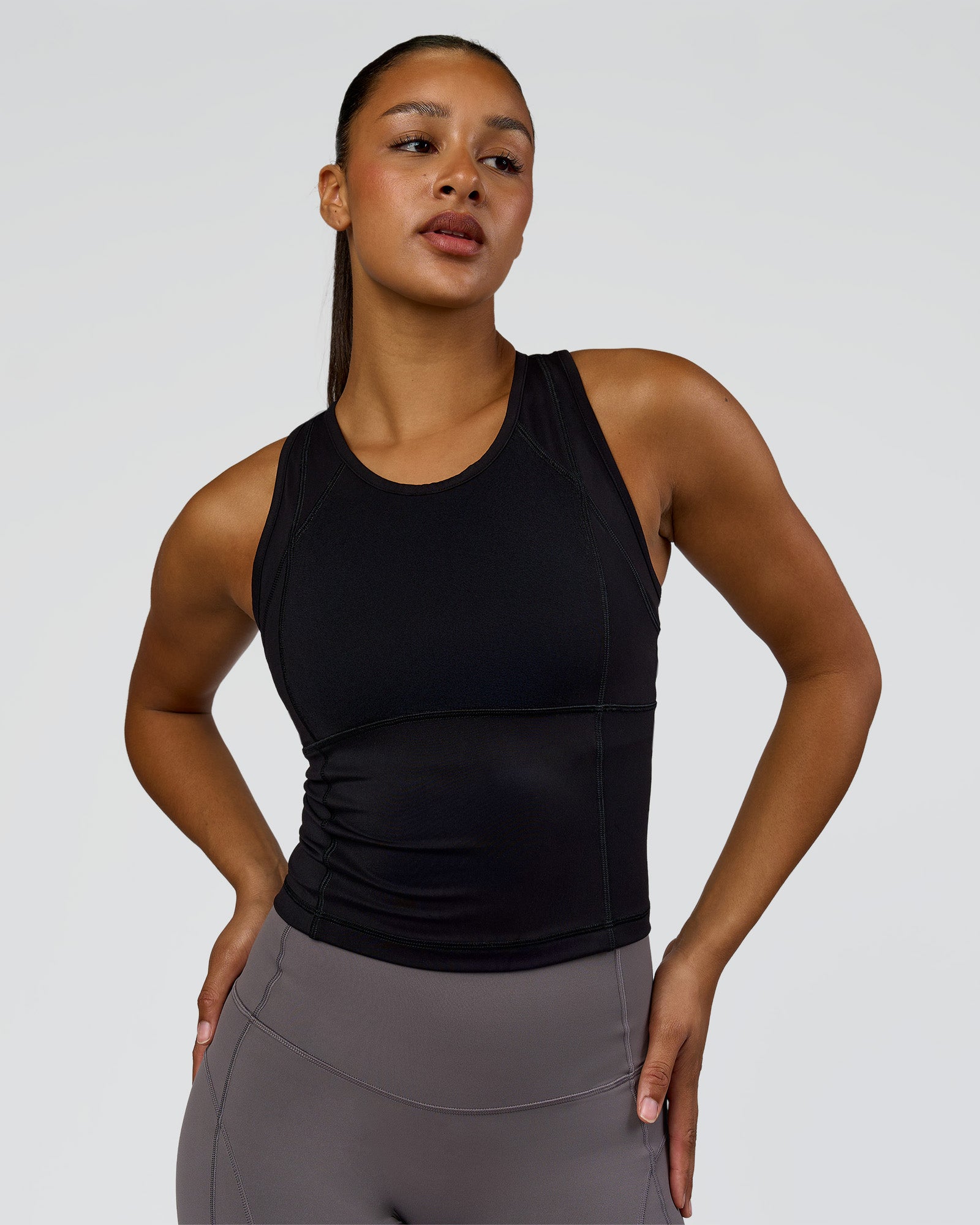 Woman wearing Bend Performance Tank - Black | Model:Rosie | Size:S