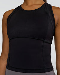 Woman wearing Bend Performance Tank - Black | Model:Rosie | Size:S