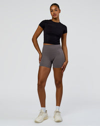 Woman wearing Bend Performance Tee - Black | Model:Rosie | Size:S