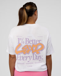 Woman wearing Break Through FLXCotton Oversized Tee - White-Pale Lilac | Model:Renee | Size:S
