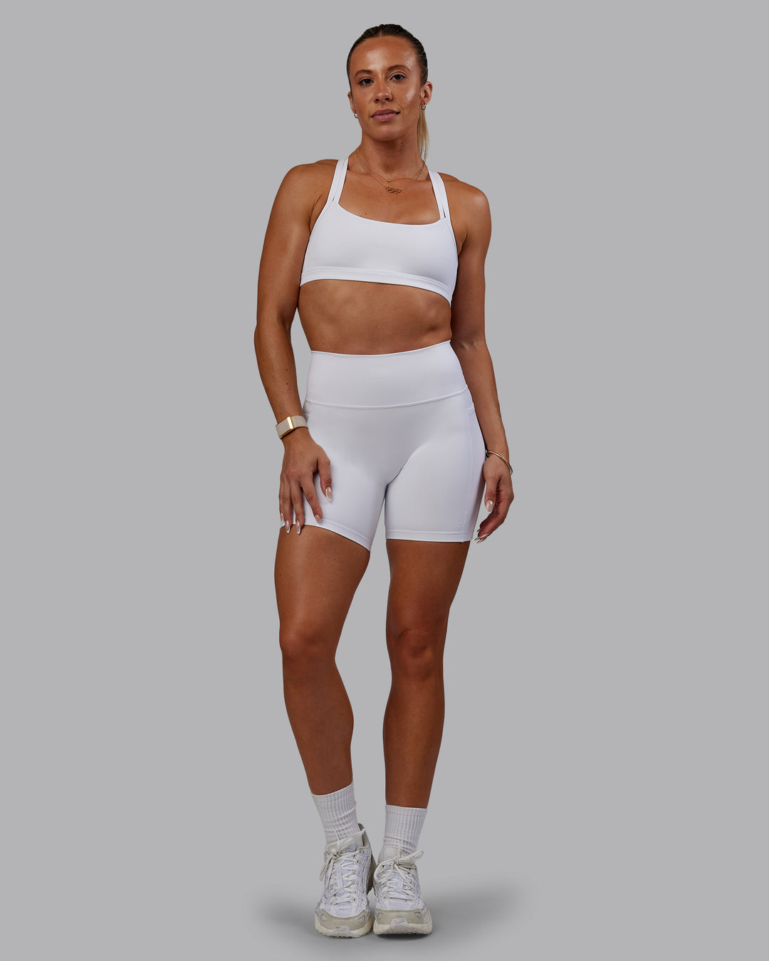 Woman wearing Bree Masters Fusion Ultra High-Rise 6&quot; Short Pockets - White