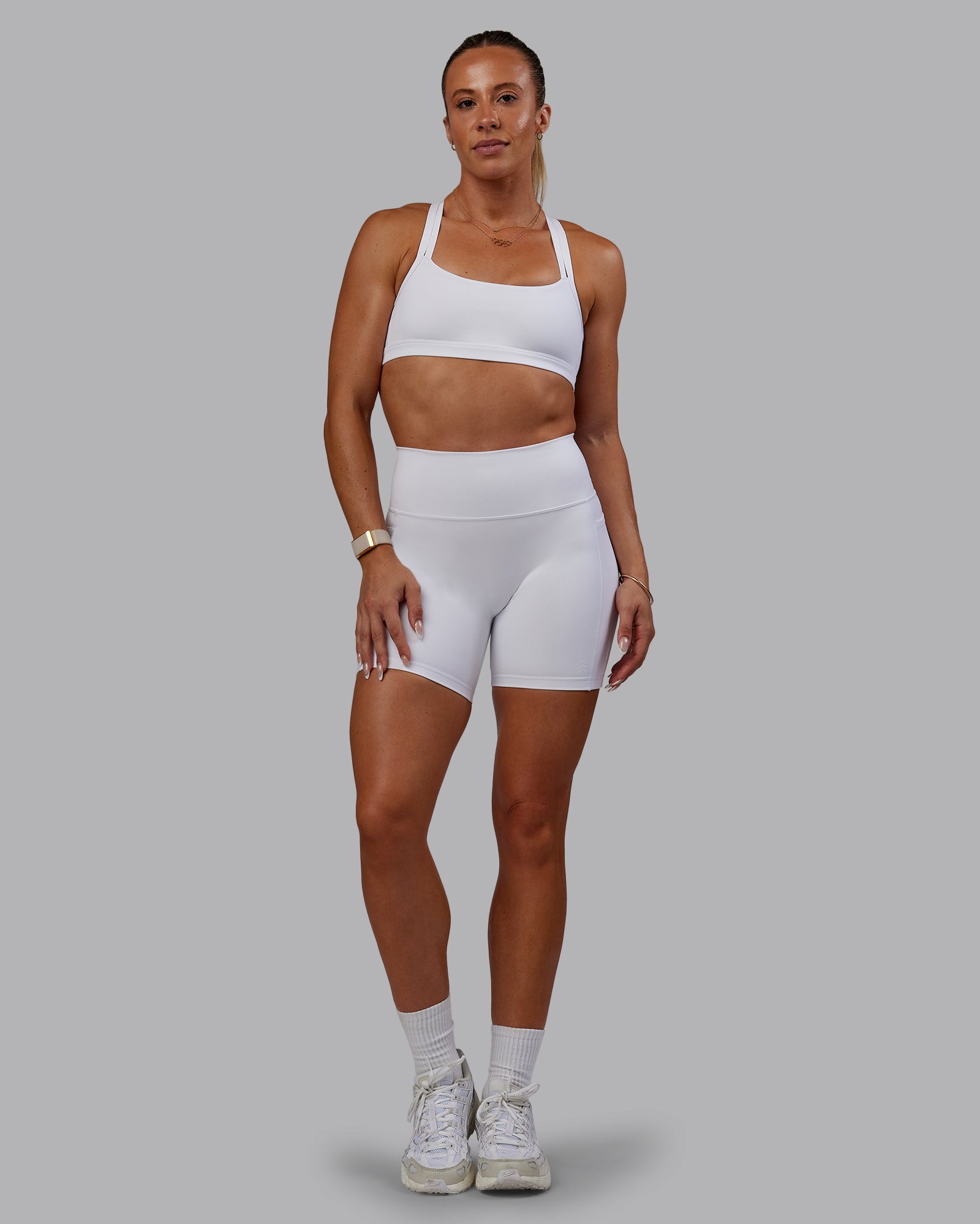 Woman wearing Bree Masters Fusion Ultra High-Rise 6" Short Pockets - White