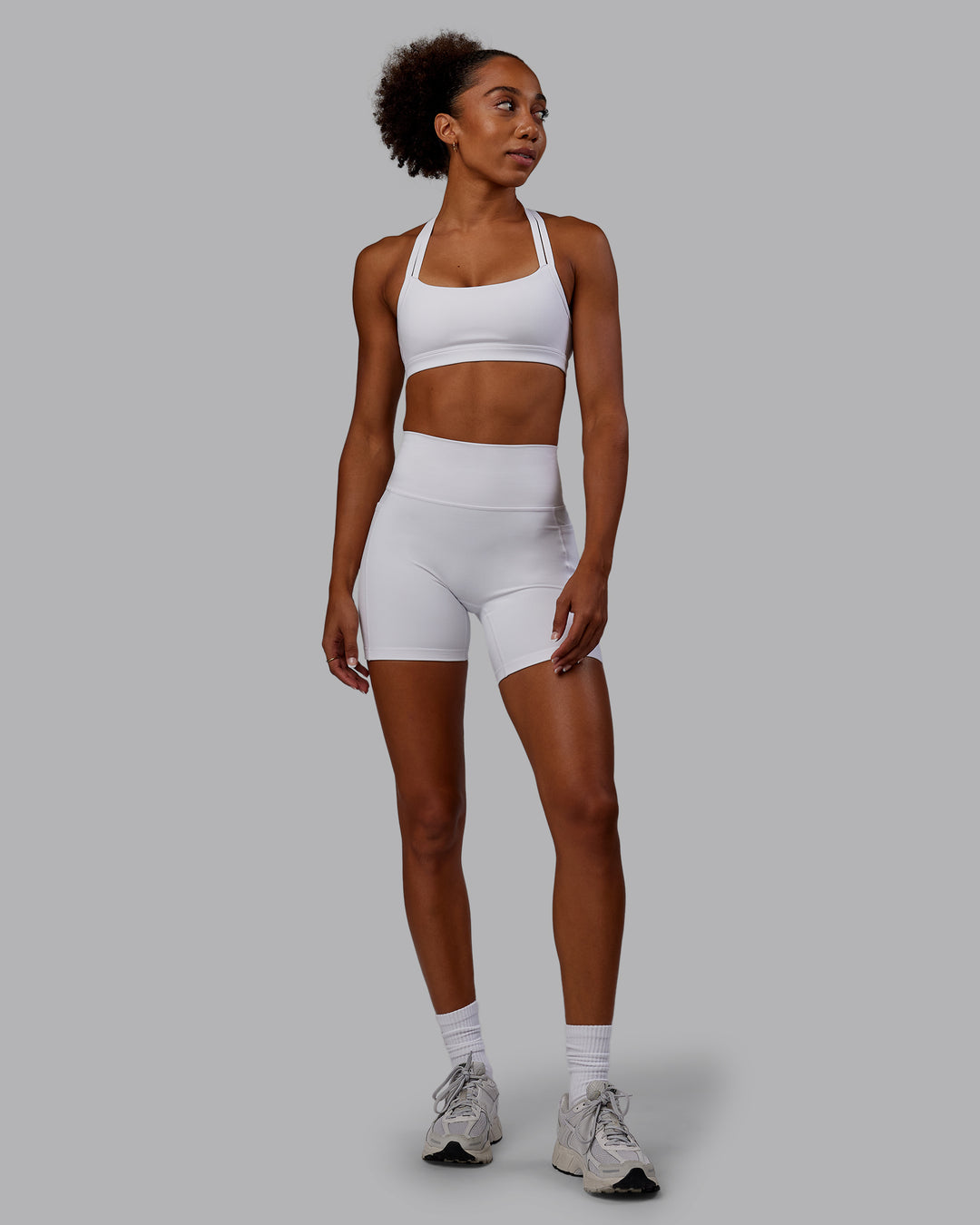 Woman wearing Bree Masters Fusion Ultra High-Rise 6&quot; Short Pockets - White