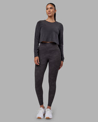 Woman wearing Breeze Long Sleeve Training Tee - Black | Model:Rhiley | Size:S