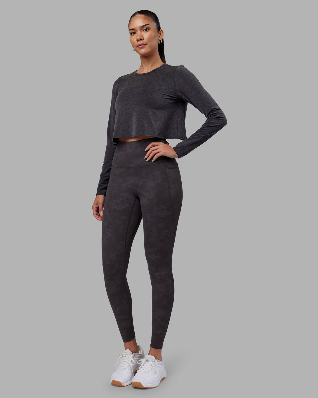Woman wearing Breeze Long Sleeve Training Tee - Black | Model:Rhiley | Size:S