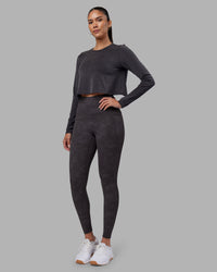 Woman wearing Breeze Long Sleeve Training Tee - Black | Model:Rhiley | Size:S