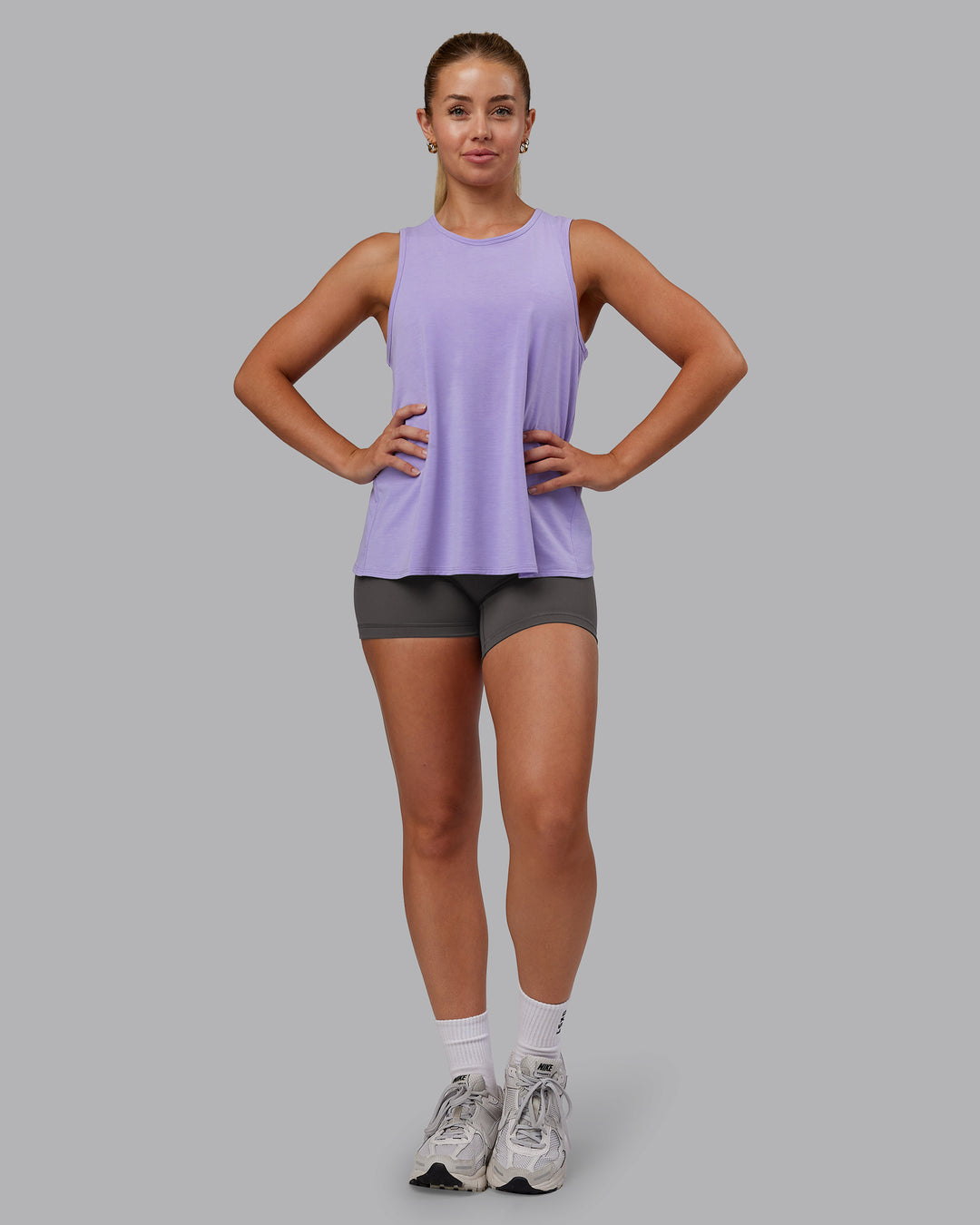 Woman wearing Breeze Training Tank - Violet Ray | Model:Hannah | Size:S