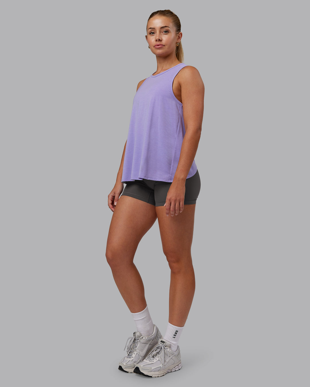 Woman wearing Breeze Training Tank - Violet Ray | Model:Hannah | Size:S