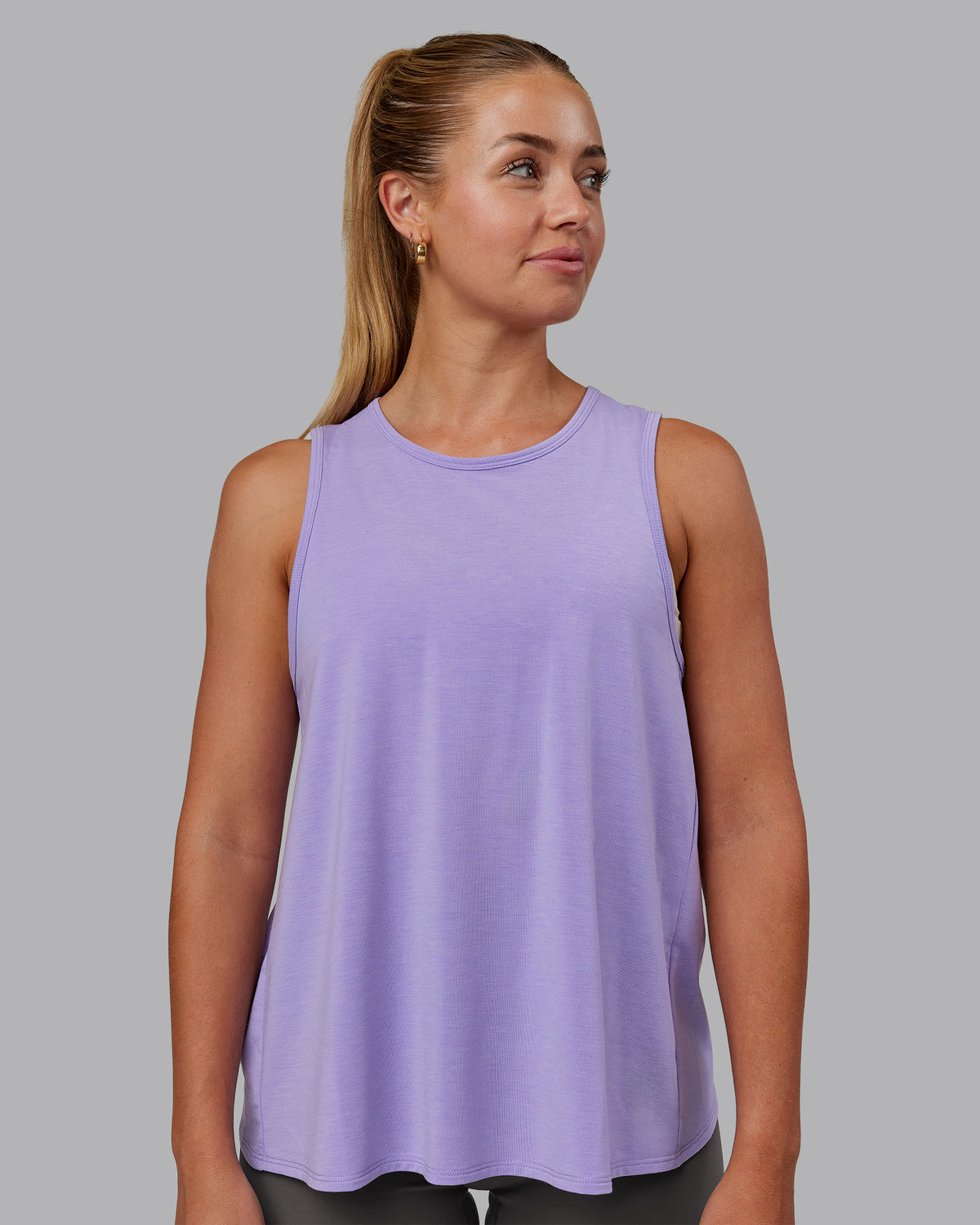 Woman wearing Breeze Training Tank - Violet Ray | Model:Hannah | Size:S