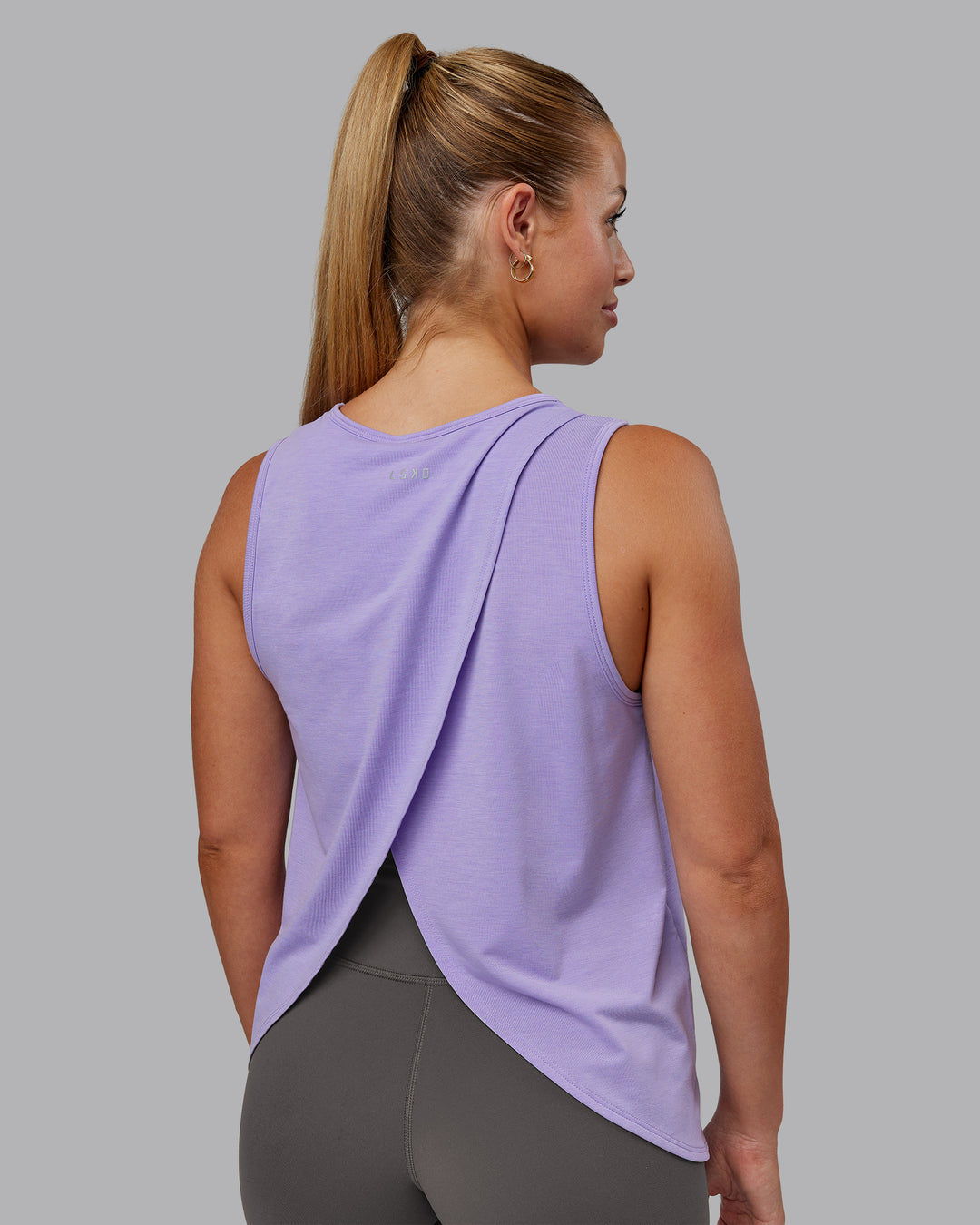 Woman wearing Breeze Training Tank - Violet Ray | Model:Hannah | Size:S
