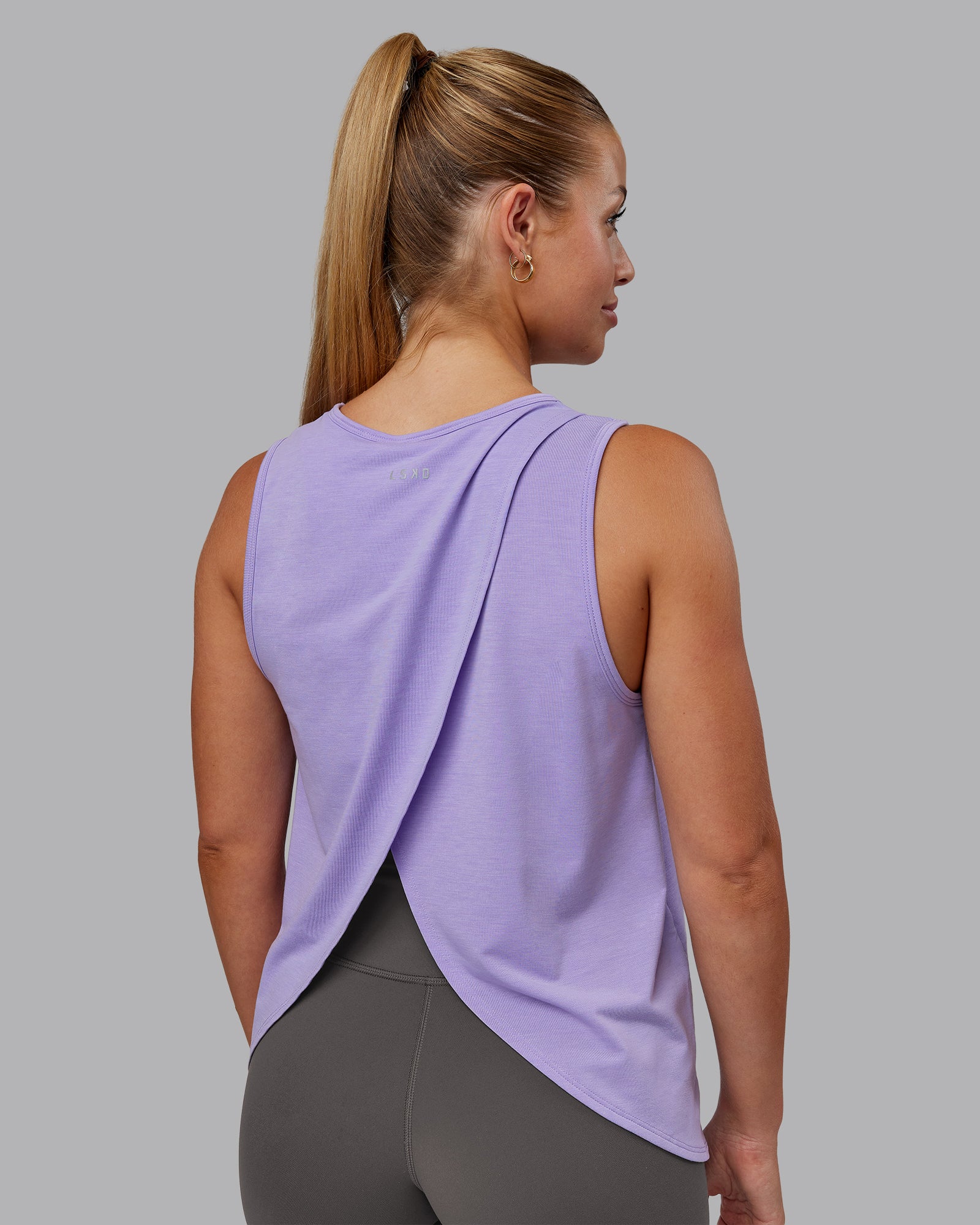 Woman wearing Breeze Training Tank - Violet Ray | Model:Hannah | Size:S