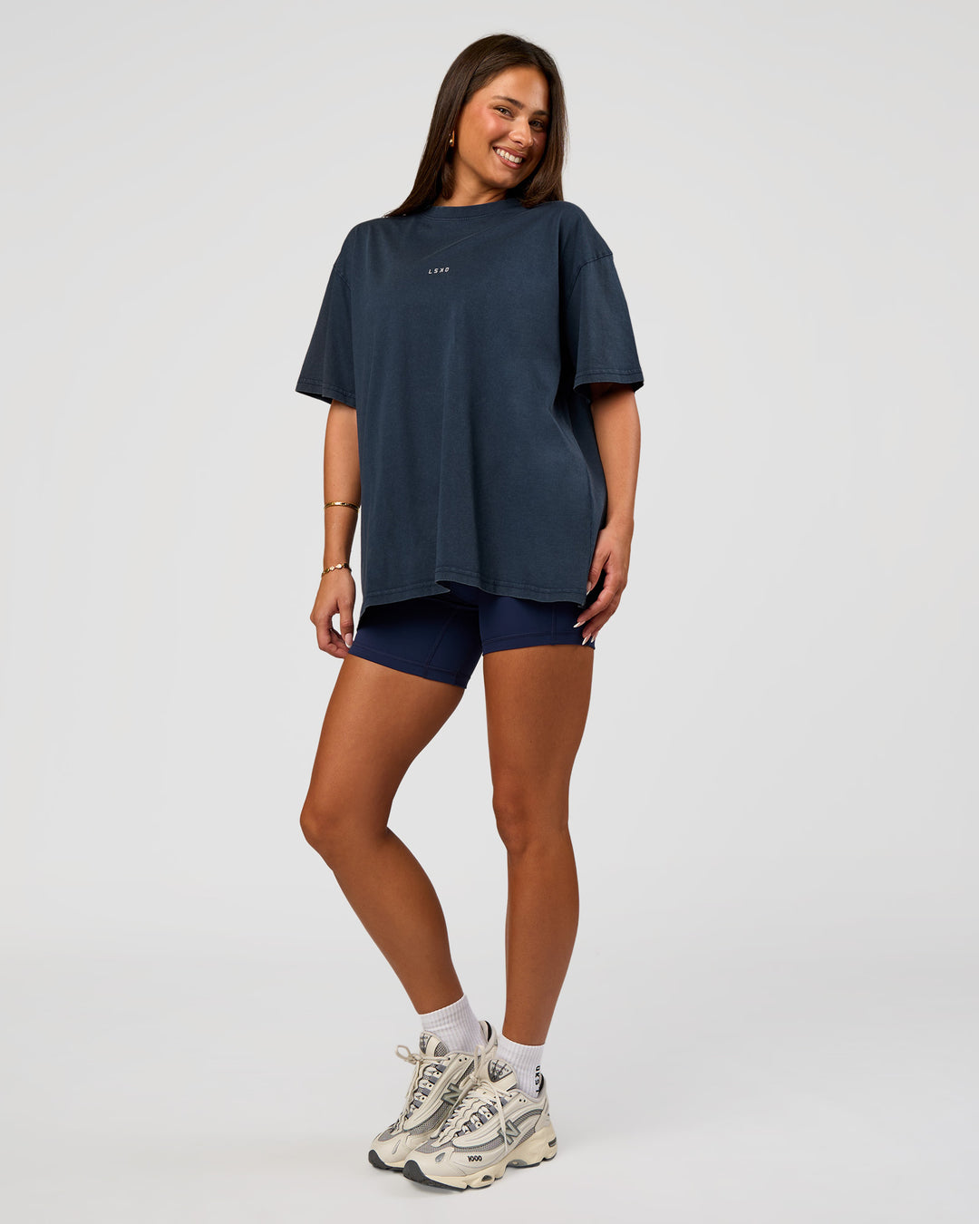 Woman wearing Built On Values Oversized Washed Tee - Future Navy Washed-White | Model:Bianca | Size:S