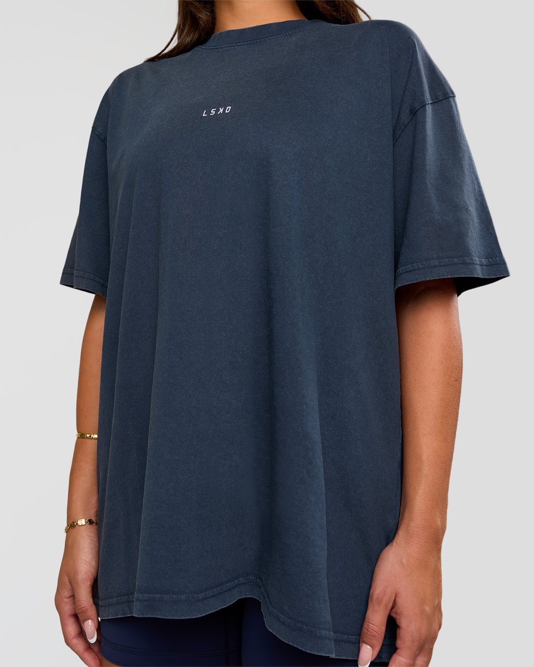 Woman wearing Built On Values Oversized Washed Tee - Future Navy Washed-White | Model:Bianca | Size:S